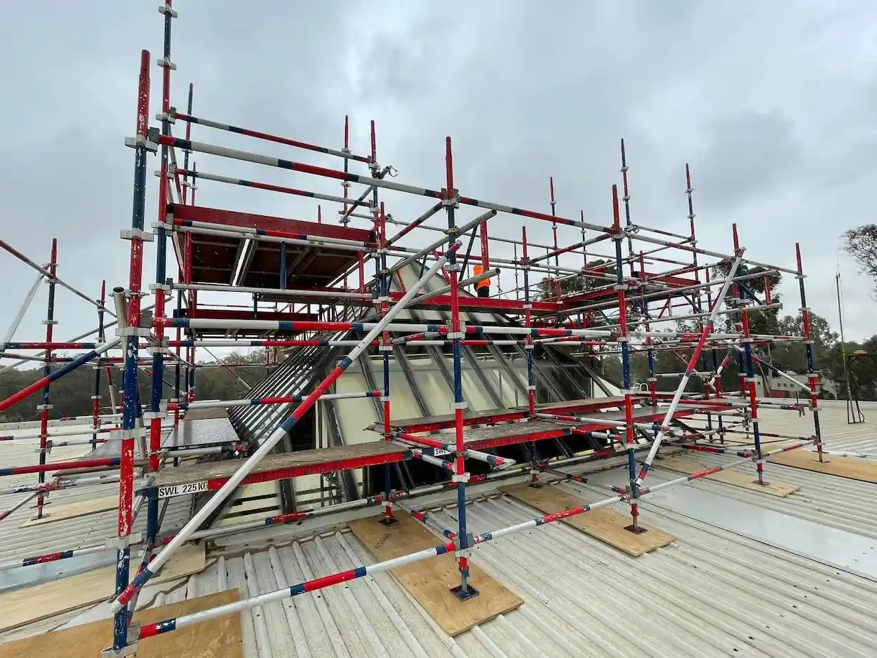 Scaffolding on a roof for a commercial job completed by Ideal Built.